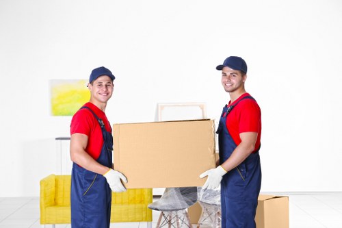 Sofa removal team preparing for transport in South West London