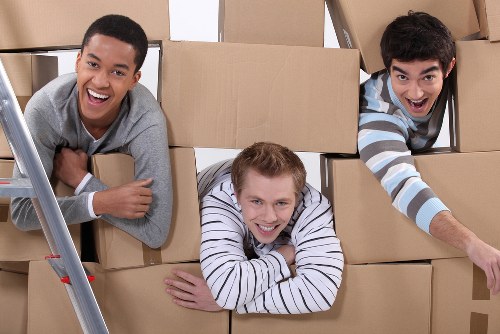 Professional sofa removal team at work in Crawley