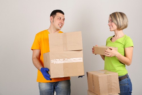 Team efficiently handling sofa removal process