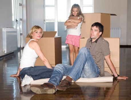 Sofa being loaded onto a removal truck in Oxford