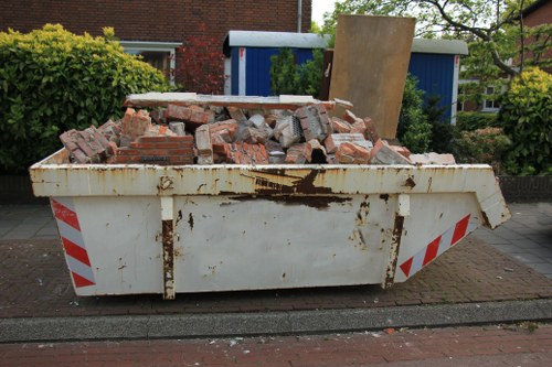 Professional movers handling a sofa during removal