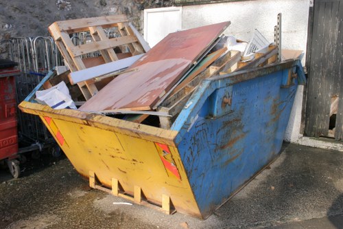 Professional movers assessing loft clearance